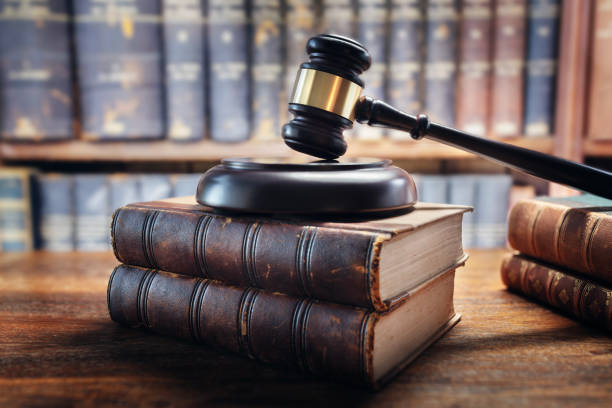 A judge's gavel on law books.